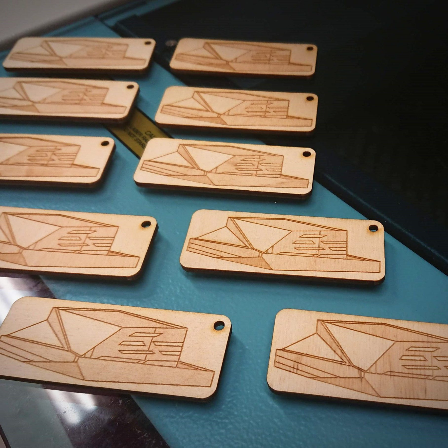LaserCut__KeyChain_closeup keychains cut with a laser cutter